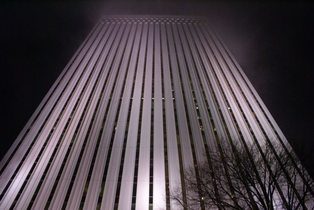 Fog lifts on a well lit building in Uptown Charlotte 