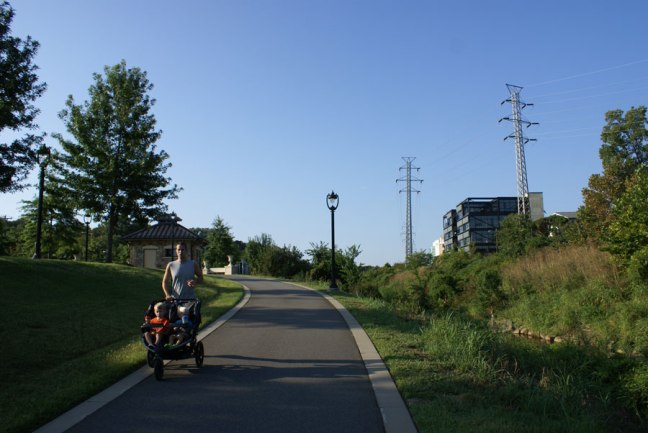 Jogging with the kids on the Little Sugar Creek Greenway near Uptown Charlotte.